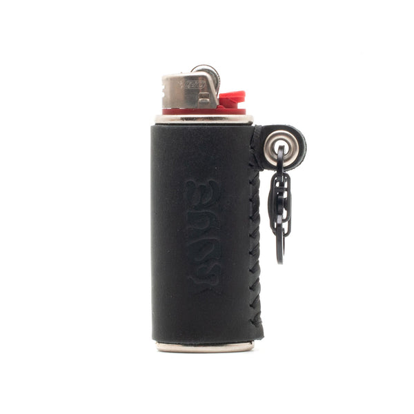 ALL CAPS STUDIO + Alterior - Lumumba Lighter Keychain - Black